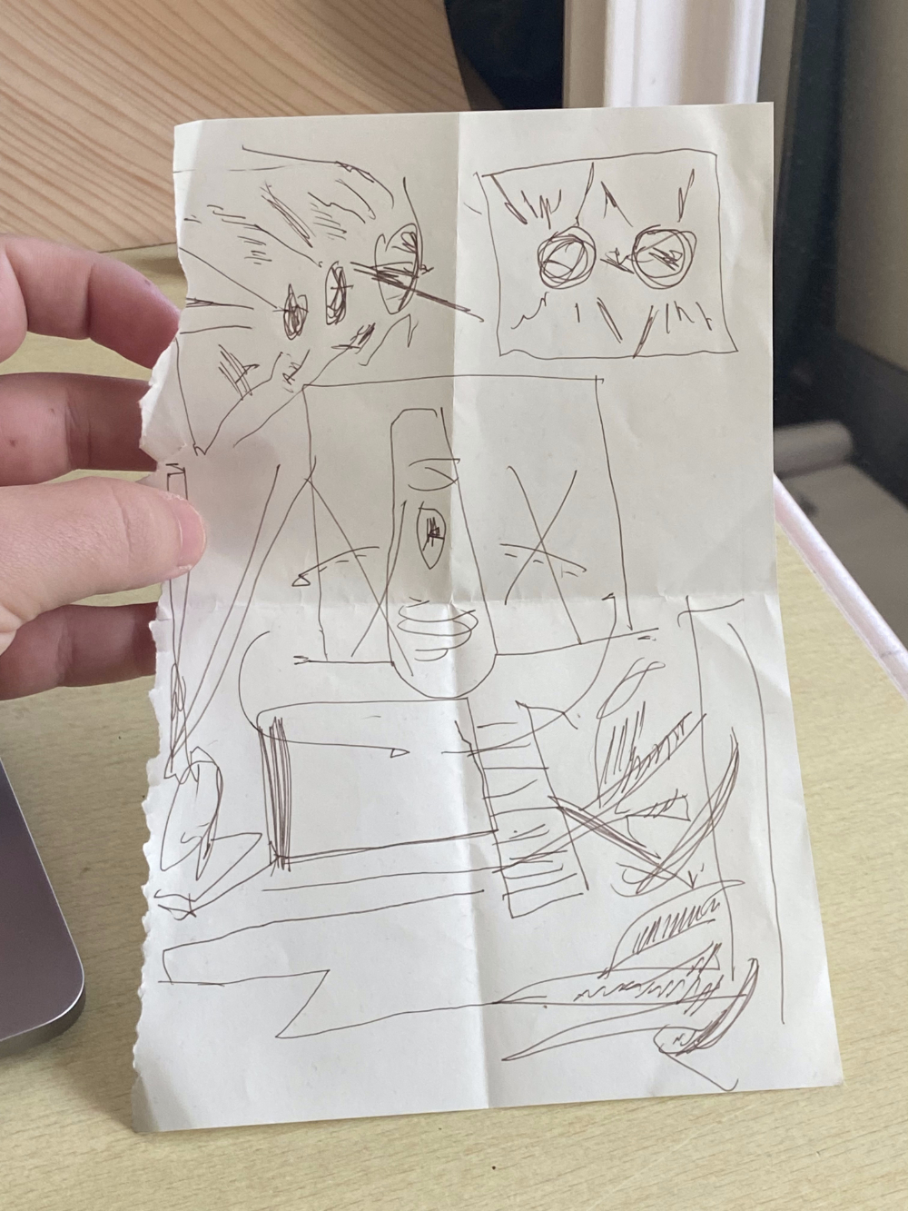 A single sheet of paper showing an abstract line drawing.